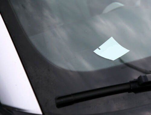 Southie Parking Wars: One note left on a car on Telegraph Street gets a response.
